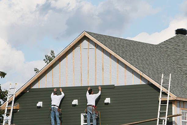 Professional Siding Replacement technician working in Melville, NY